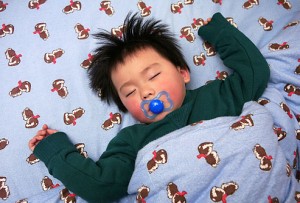 getty_rf_photo_of_baby_sleeping_with_pacifier