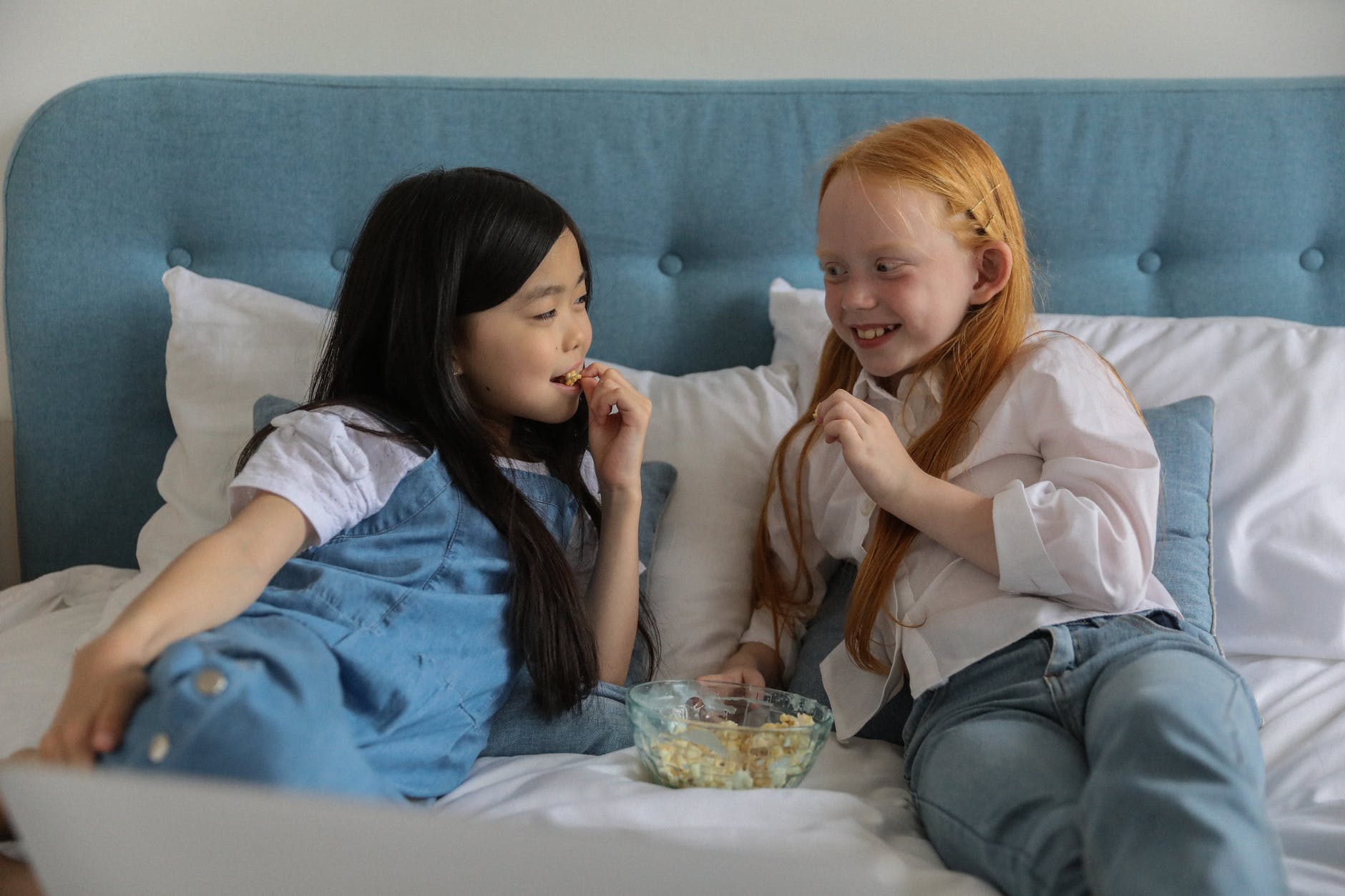 girls eating popcorn