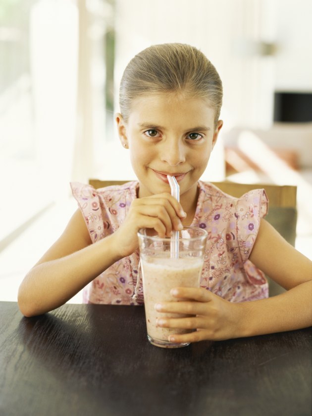 girl drinking smoothie