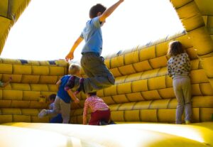 Kids playing bounce house