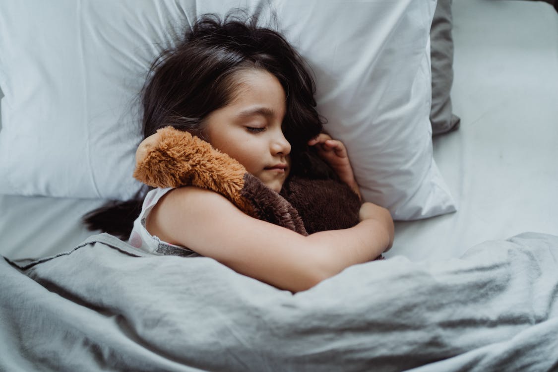 girl in bed sleeping