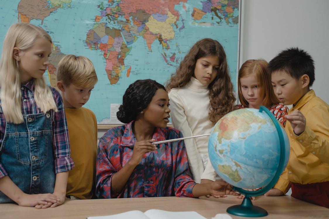 teacher students globe