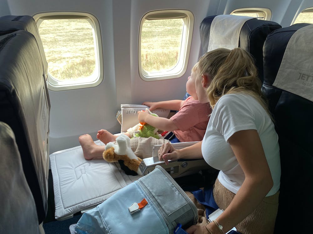 mother and baby on a plane
