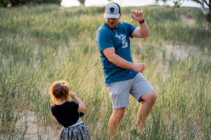 Child and Father in the grass