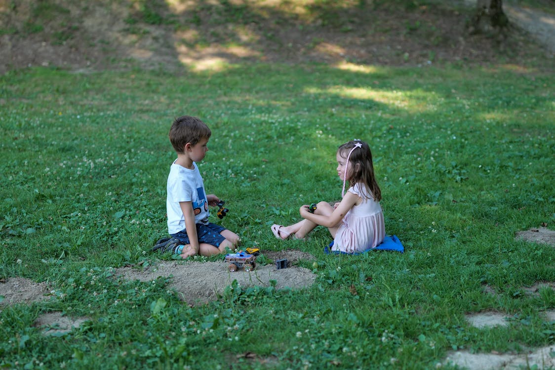 kids in the grass