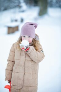 child with snowball 