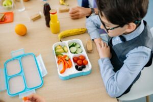 child eating veggies