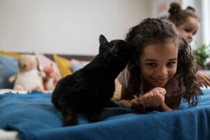 girl and black cat