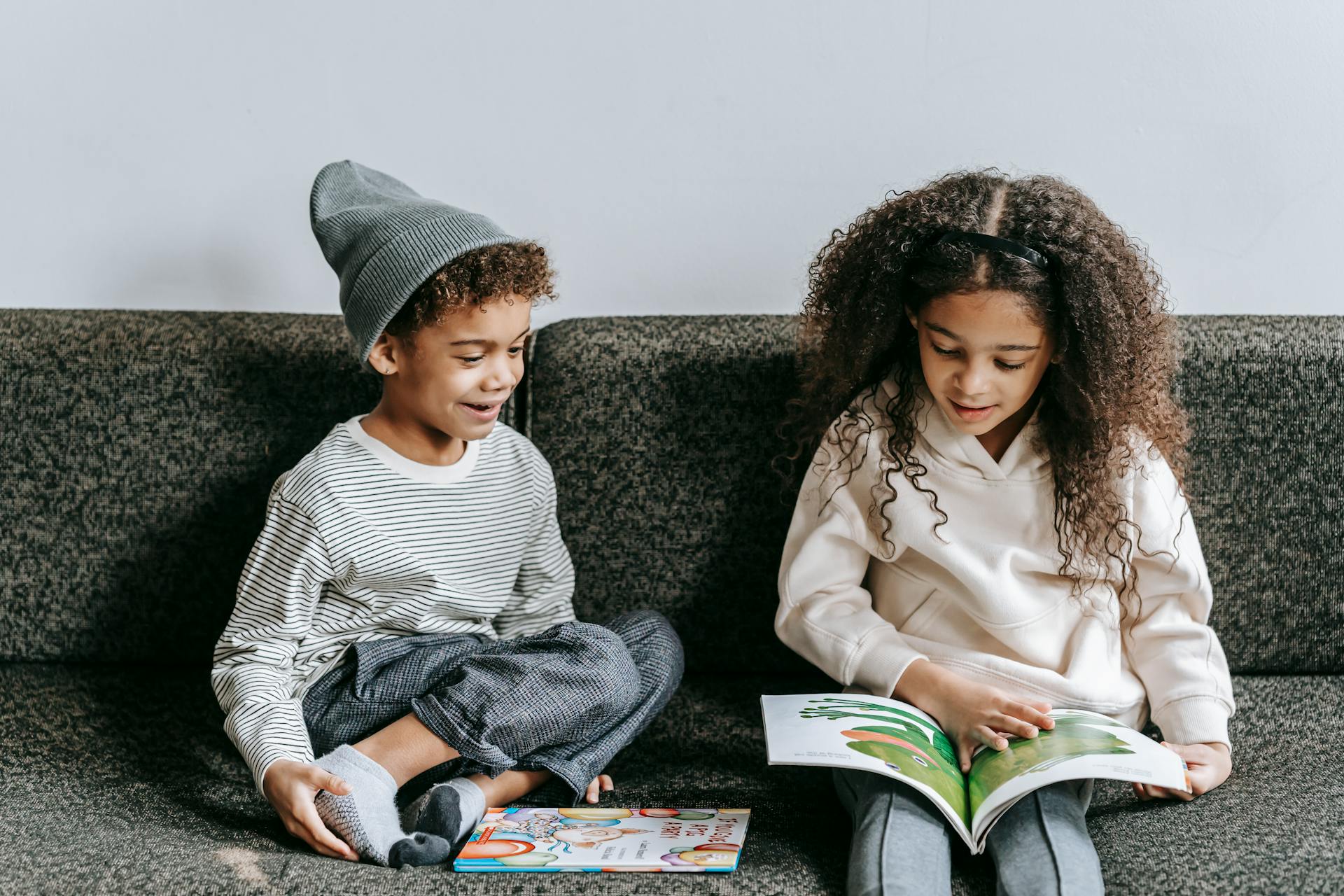 Kids reading on couch